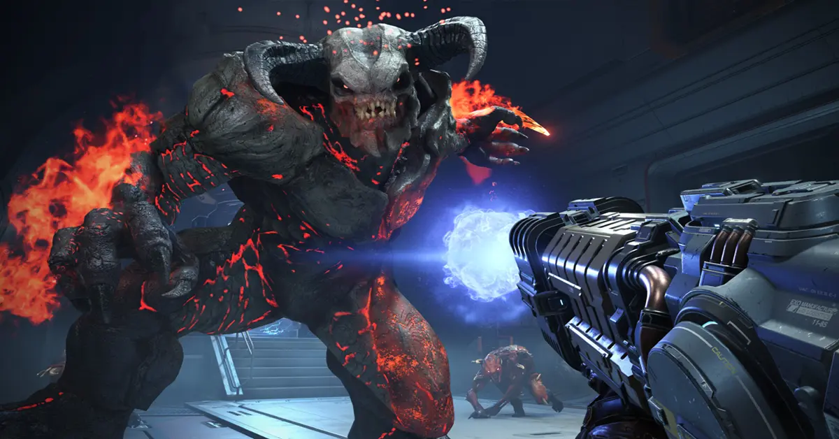 Perspetiva na primeira pessoa do Marine de DOOM a executar um Glory Kill num Imp.
