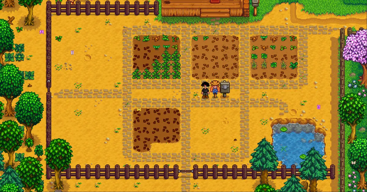 Uma clareira vibrante e cheia de vegetação numa manhã ensolarada de primavera em Stardew Valley.